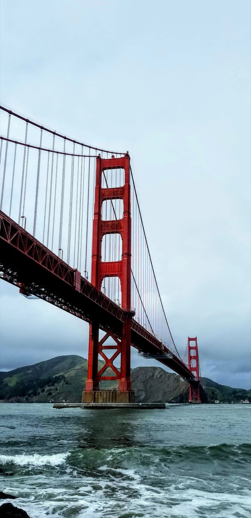Golden Gate Bridge rising into fog